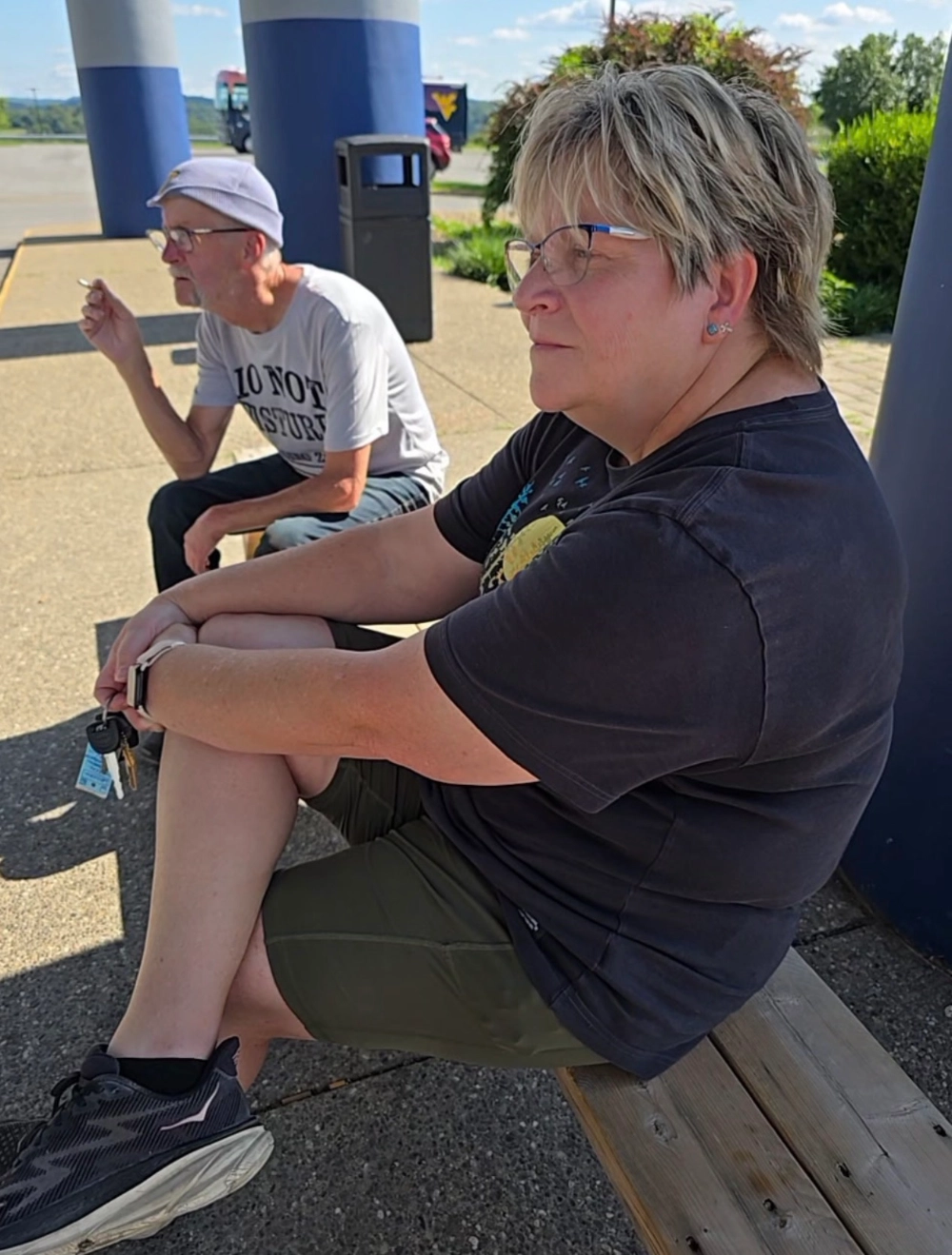 Two men named John on a bus bench!